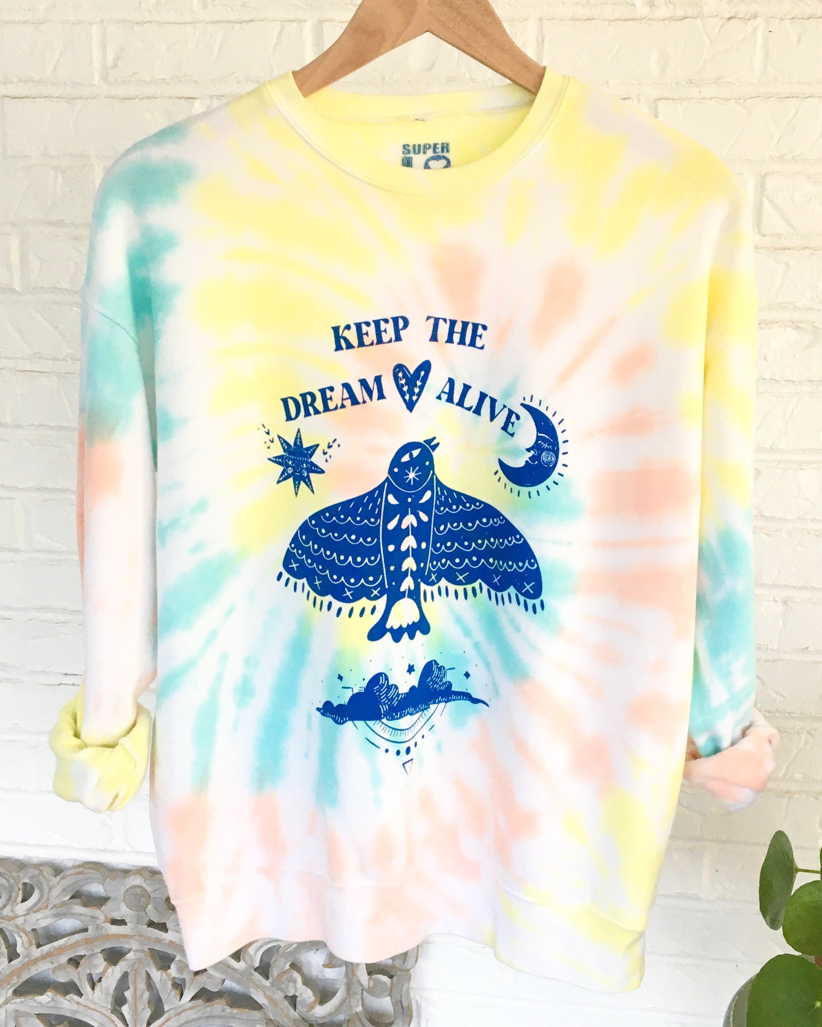 keep-the-dream-alive-unisex-tie-dye-sweatshirt-superlovetees-graphic-tees-inspired-by-love
